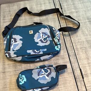 Shoulder bag with small utility bag.